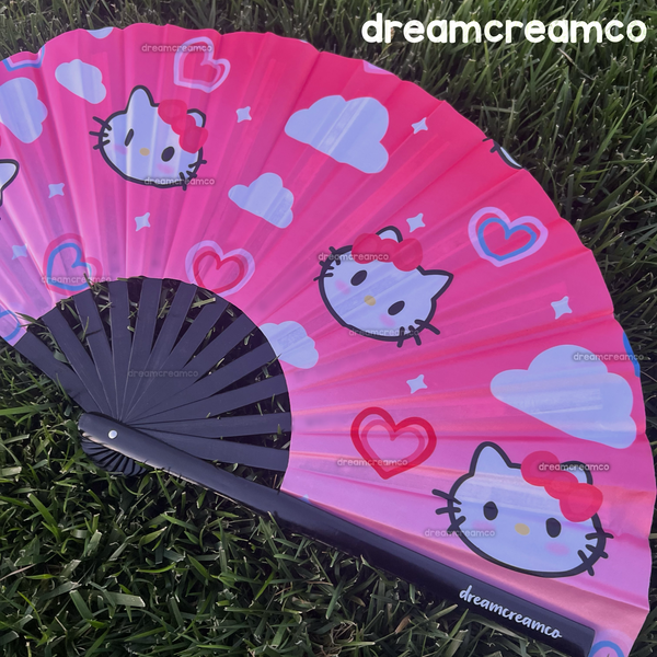 Super cute folding hand fan to cool you down at a crowded convention and/or music festival! These large, durable fans can also be used to elevate your festival fashion, and decorate your spaces as home decor!  ♡ Designed by DreamCreamCo ♡ Size: 13" (inches) while closed ♡ Design printed onto fabric ♡ Bamboo wooden handle ♡ Folding fan capability
